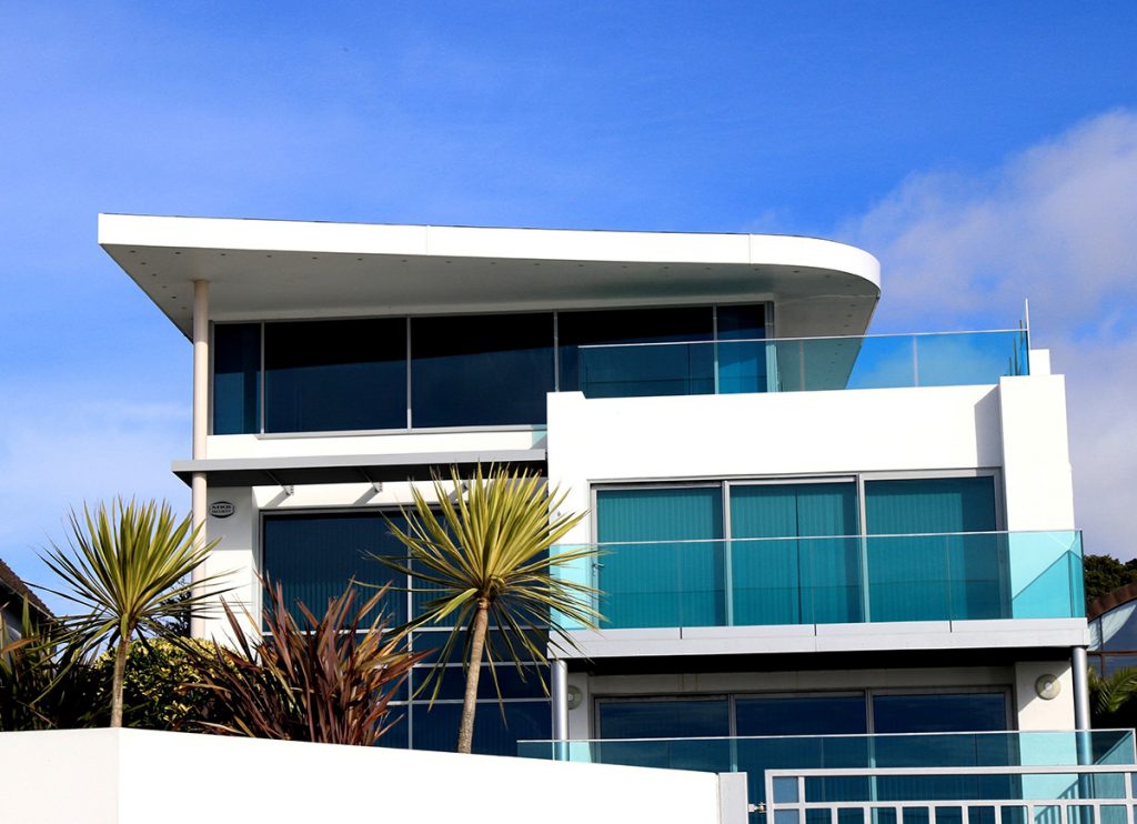 Palatial mansion exterior featuring modern luxury.